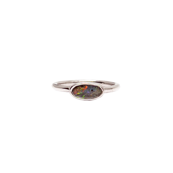 Sterling silver rhodium-plated ring featuring an oval Boulder opal with a captivating array of colours set in a streamlined, elegant band | Fremantle Opals