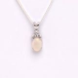 Sterling Silver Solid Opal Pendant with Cubic Zirconia