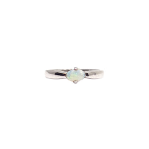 Sterling silver ring with a central Australian white opal, displaying subtle pastel flashes, set in a simple and elegant claw set design. | Fremantle Opals