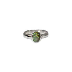 Sterling silver Boulder Opal ring with a rectangle-cut opal displaying vibrant green and orange hues, set in a thick bezel silver band. | Fremantle Opals