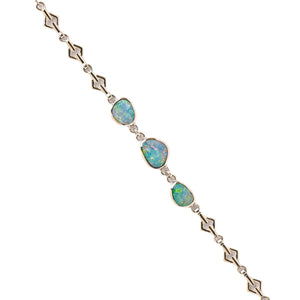 Close-up of Sterling Silver Doublet Opal Bracelet featuring three free-form doublet opals with red and green hues and flashes of blue | Fremantle Opals