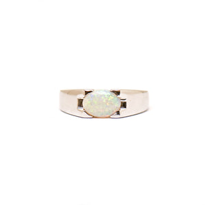 Sterling silver ring featuring a luminous oval-cut solid white Australian opal, set against a polished band. | Fremantle Opals