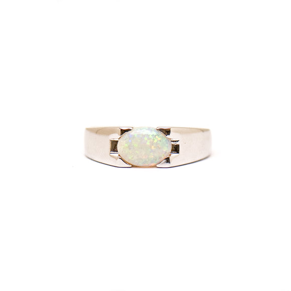Sterling silver ring featuring a luminous oval-cut solid white Australian opal, set against a polished band. | Fremantle Opals